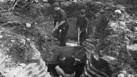 Boy Scouts investigate ruins in 1960s